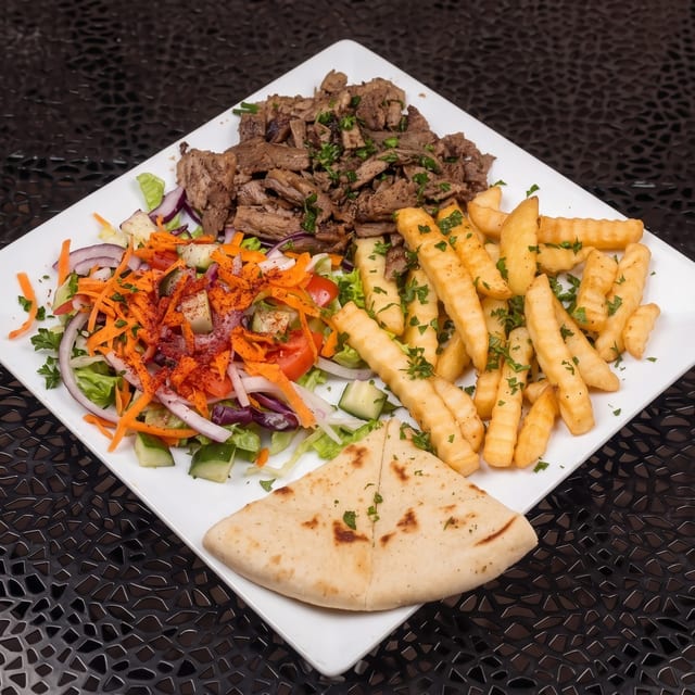 Meat Shawarma With Choice Of Your 2 Sides.